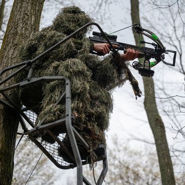 Crossbow Hunter in Tree