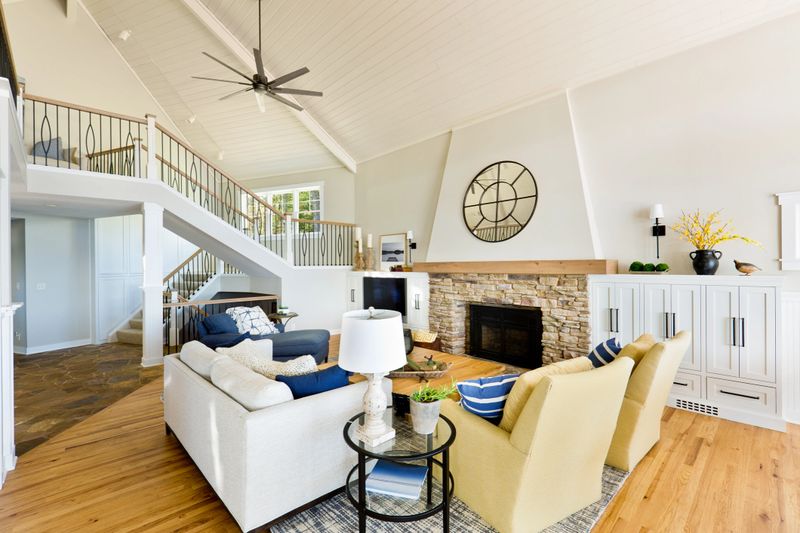A contemporary living room with fireplace and TV in a modern home.