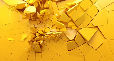 Yellow background broken into pieces falling apart