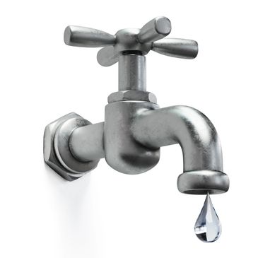 Close-up of a metal faucet with a single water droplet falling.