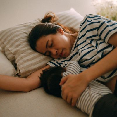 Mom and Baby sleeping
Baby and mom breastfeeding
cuddly moment between mom and baby