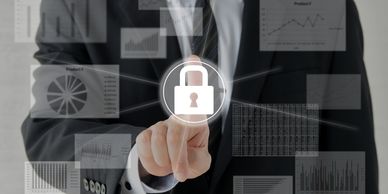 Businessman securing data with a digital lock interface.