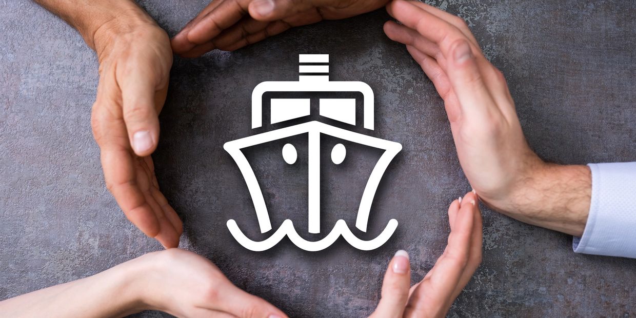 Diverse hands forming a circle around a ship icon, symbolizing protection.