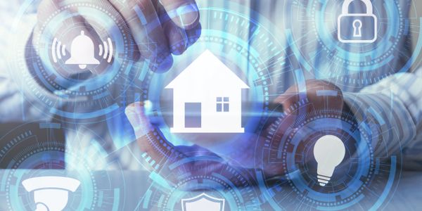 Hands interacting with smart home security icons including lock, shield, and alert symbols.