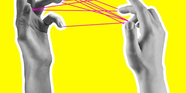Two hands playing cat's cradle with purple string on a yellow background.