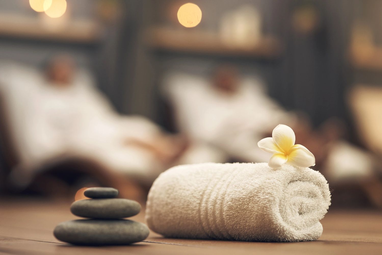 A towel with white flower