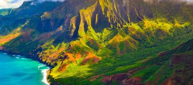 Vibrant coastal cliffs with lush greenery and ocean.