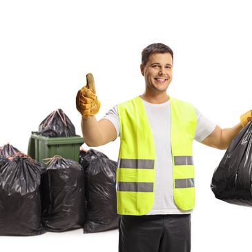 Man in safety vest holding a trash bag and giving thumbs up.