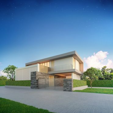 Modern two-story house with clean lines and a gated entrance under a clear blue sky.