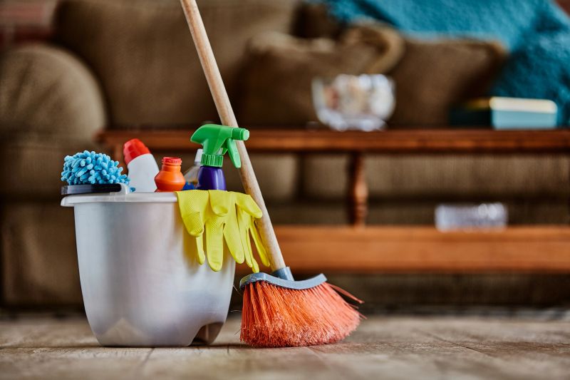 Plastic bucket with cleaning supplies in home ready for cleaning