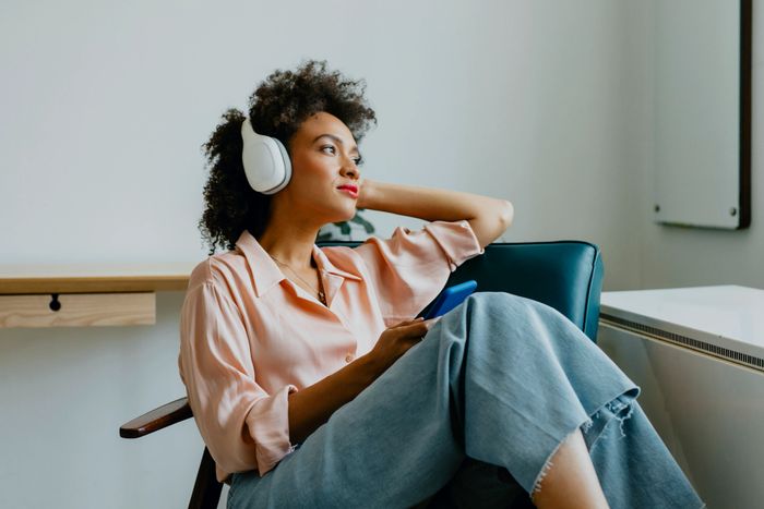 Woman listening on headphones
