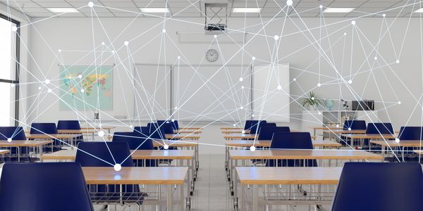 Empty classroom with digital network connections overlay.