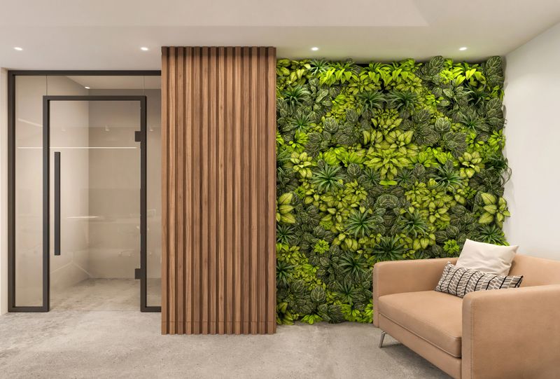 Modern office interior hallway corridor with blank wall for copy space. Wooden wall panels, green wall with plants and armchair. render