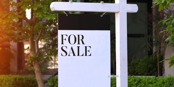 For Sale sign outside a property.