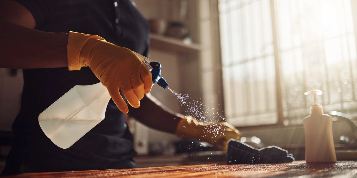 Professional cleaner tackling grime with fearless precision-deep cleaning, high standards, no shortc