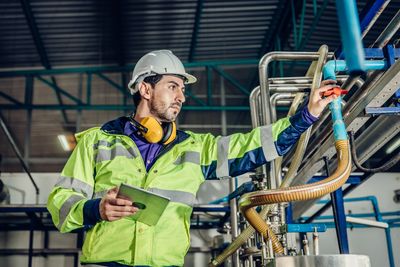 Expert engineer checking production process plant condition