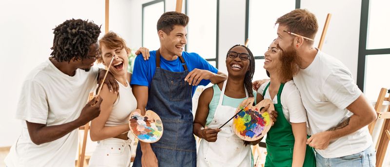 Group of people smiling happy standing at art studio.