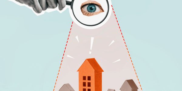 Eye inspecting a highlighted house model on a smartphone screen.