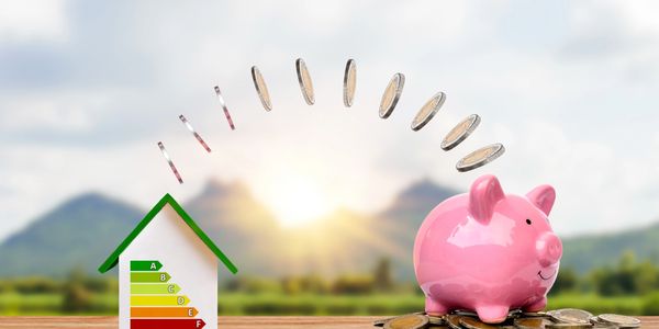 image of money being saved with energy upgrades. money going into a piggy bank. beautiful landscape 