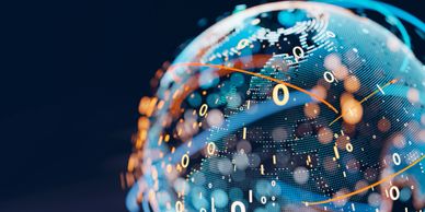 Digital globe with binary code and light trails.