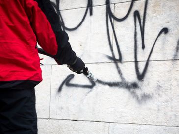 graffiti removal from wall in chester, covering wirral