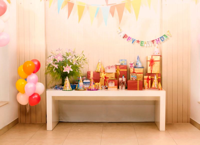 Blur image of Tables and decoration prepared for birhtday party for background usage.