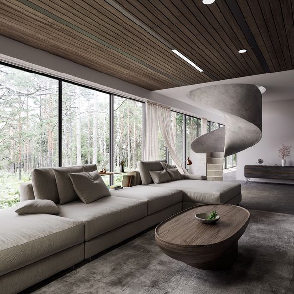 Modern living room with spiral staircase and large windows.