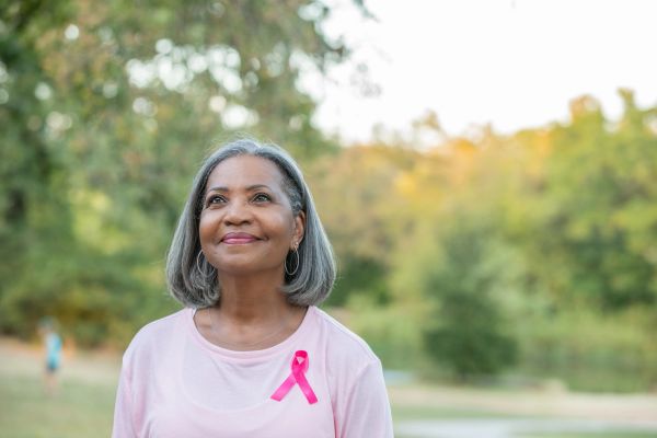 Book cover for "In the Pink," a guide for breast cancer survivors by Laurie Hatch, RD.