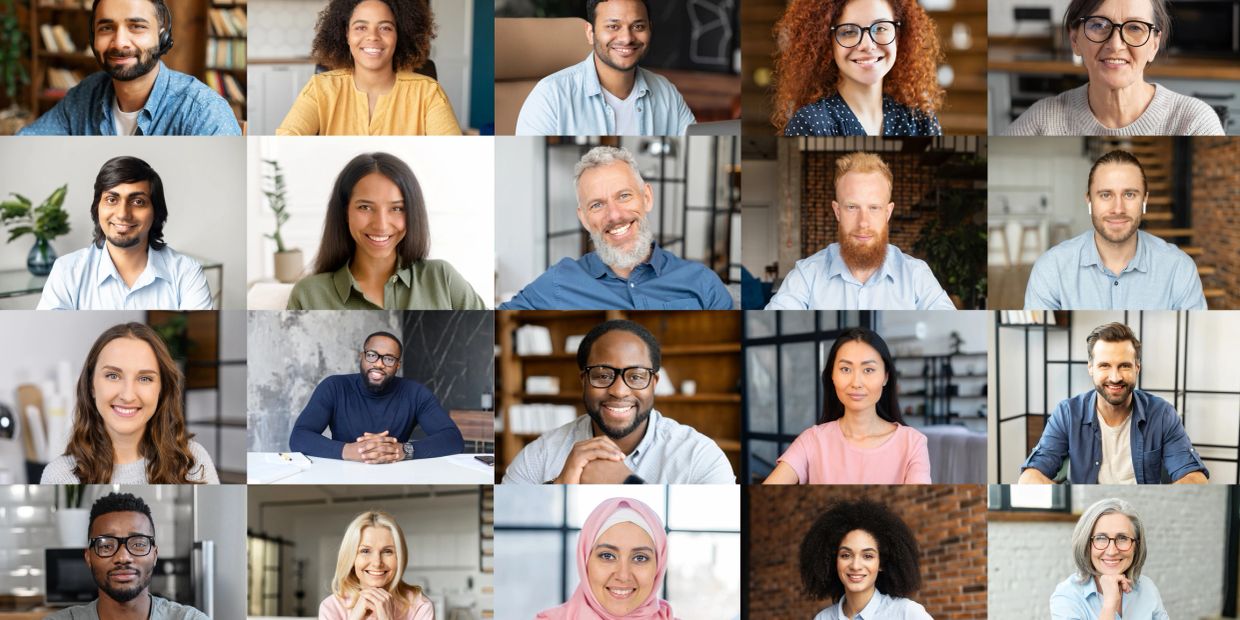 Diverse group of people smiling in a video call grid.