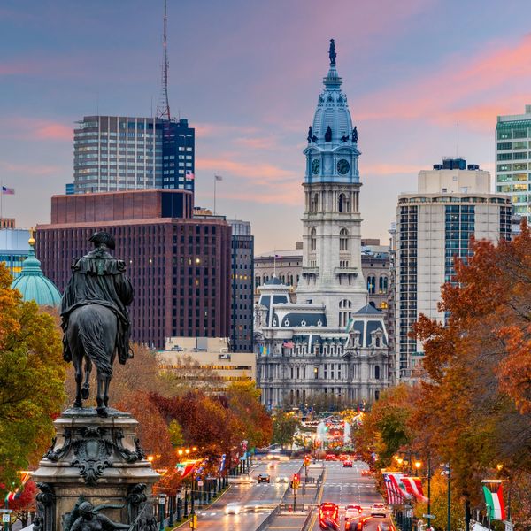 Philadelphia City Hall skyline at sunset with Benjamin Franklin Parkway