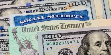 Image of social security card and money.
