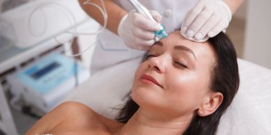 Woman receiving a facial treatment.