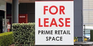 Sign advertising prime retail space for lease in a commercial area.
