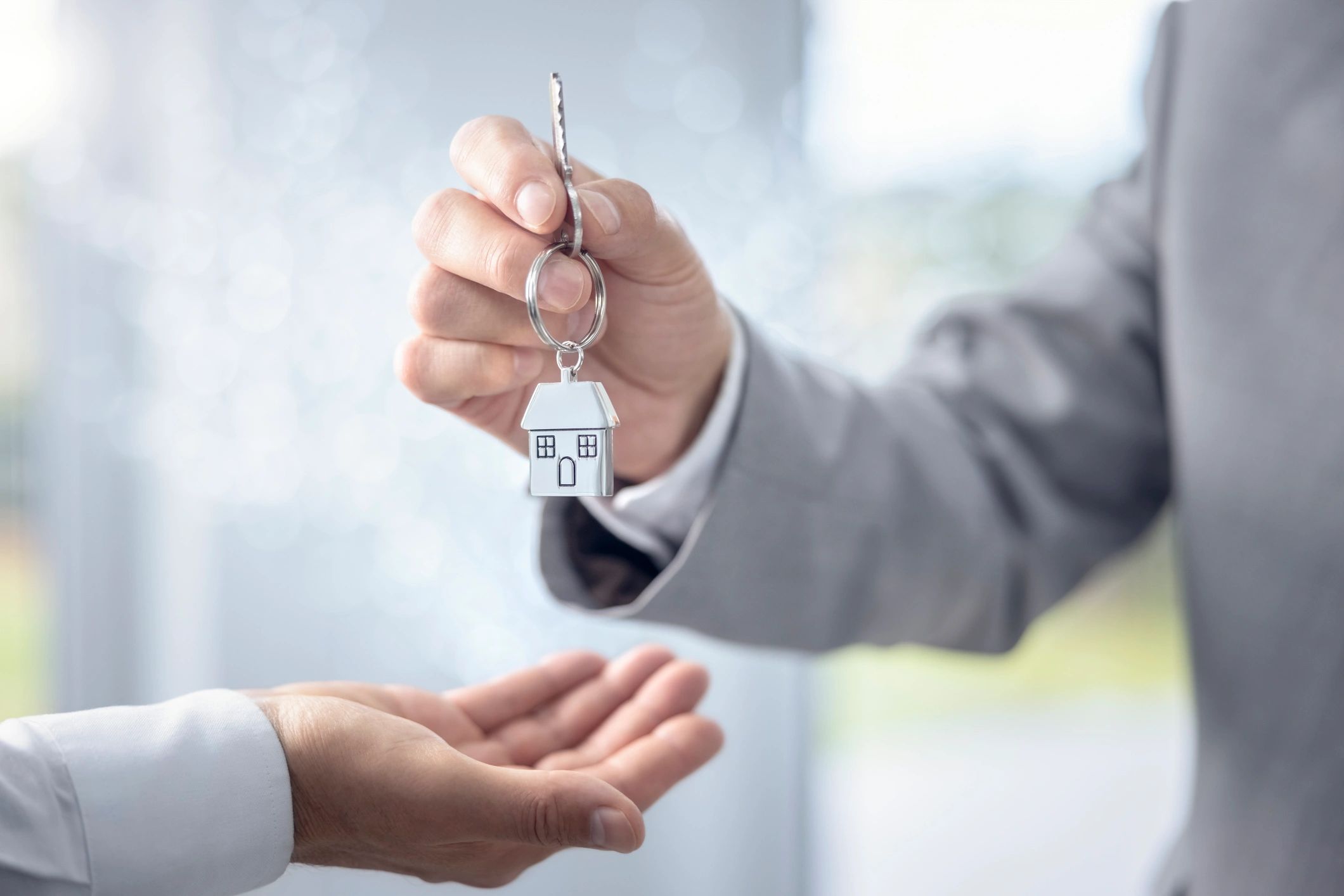 Land lord giving keys to a new tenant in Sheffield 