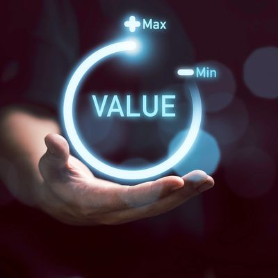 Hand holding a glowing circle representing value control.