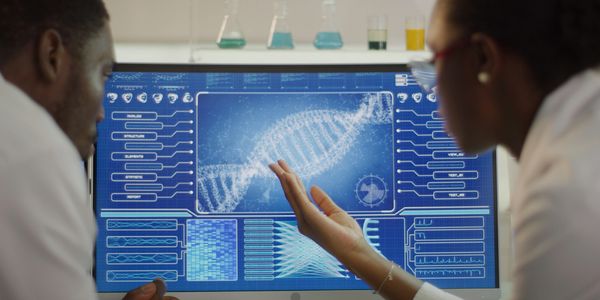 Scientists analyze DNA data on a futuristic computer screen in a laboratory.