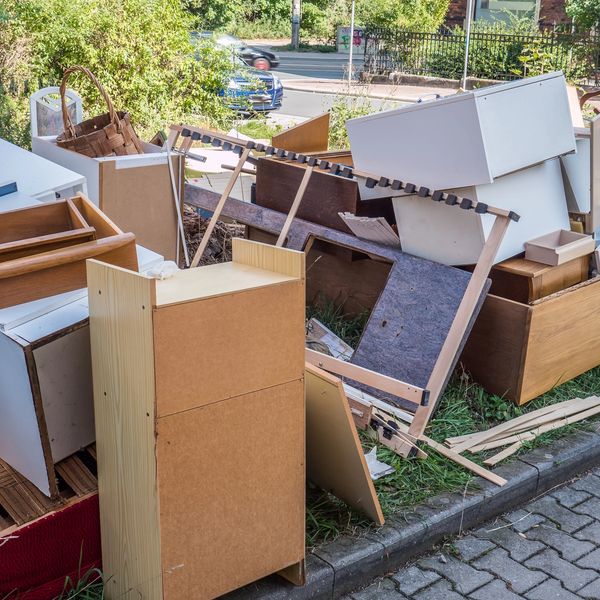 Pile of Debris from a Construction site in front yard of resident