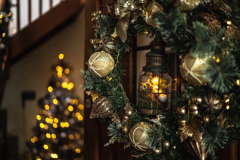 Christmas wreath hanging in front door