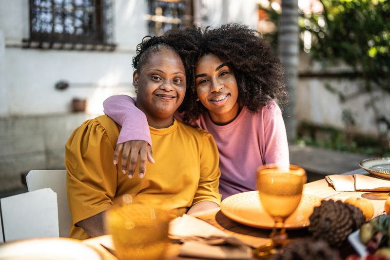 Portrait of sisters at home