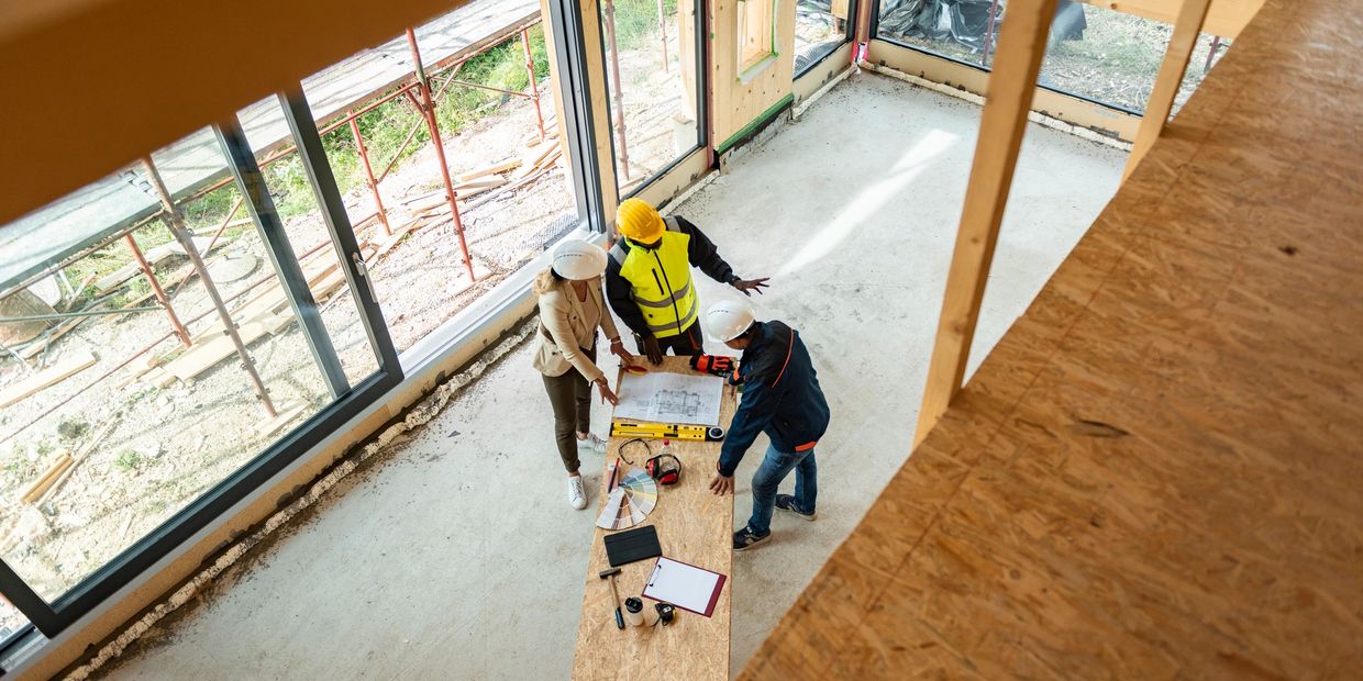 Interior view of local contractors  in an ADU that's in the middle of construction in Powell Ohio