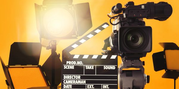 Film production setup with camera and lighting.