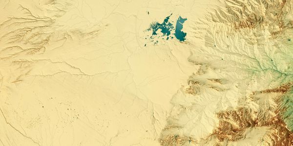 Topographic map showing desert and mountainous terrain with scattered water bodies.