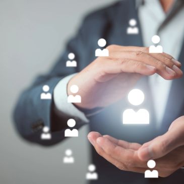 Businessman protecting digital user icons.