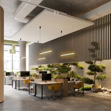 Modern office with minimalist desks and indoor garden wall.