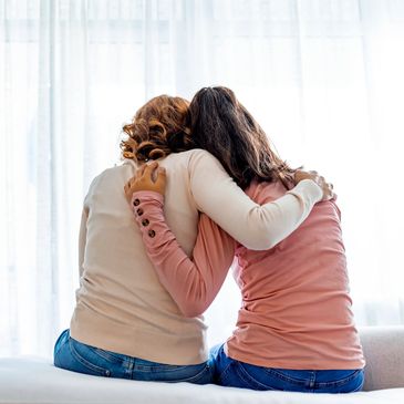 Mother daughter hug