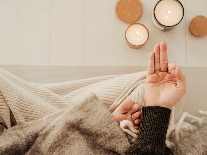 Normal mid adult woman meditating series Gyan mudraClose up of hand mudra, copy space, photo taken indoors in natural light