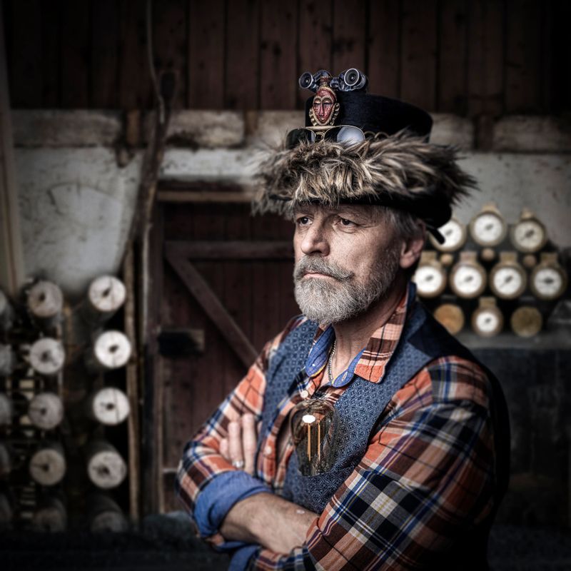 Studio shot of a steampunk gentleman. Image montage with my own images