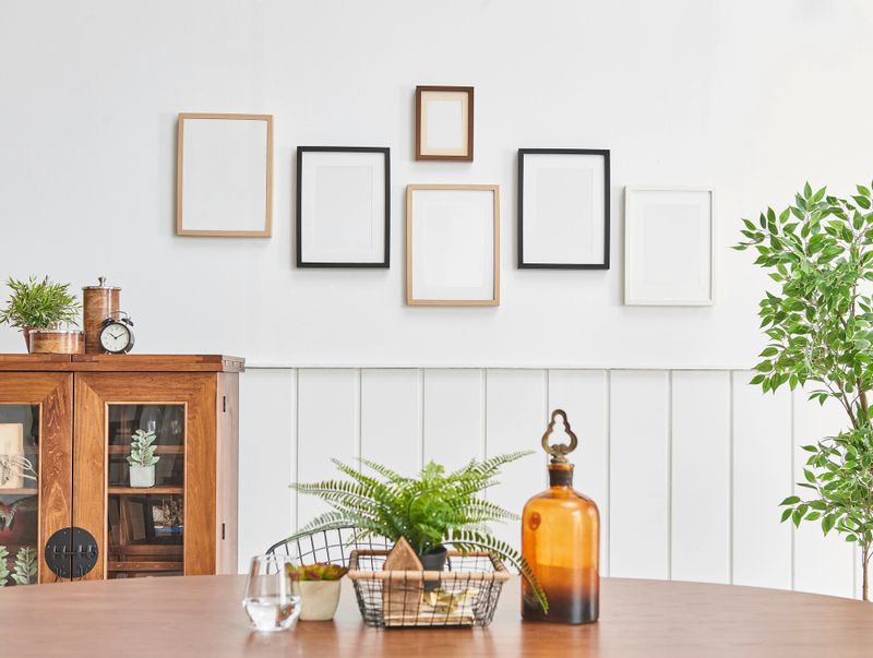 modern home interior living room style design with wooden table armchair chair pillow cushion and blanket parquet floor rug frame window armchair lampshade