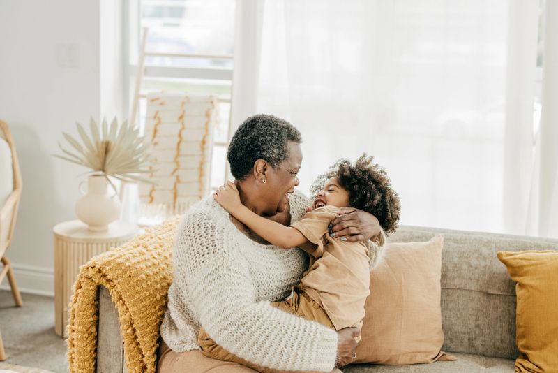 Grandmother hugging her granddaughter