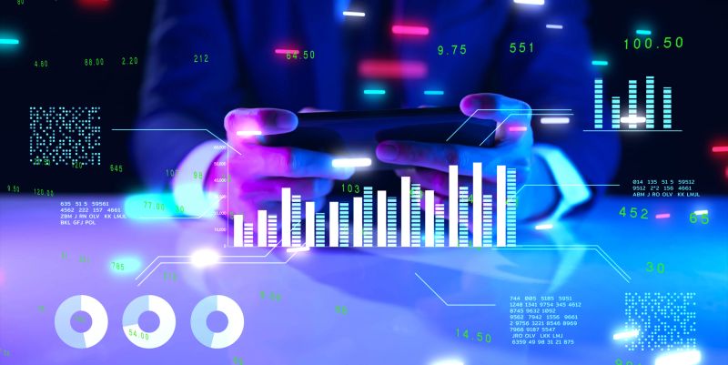 Smart businessman hand close up NFT financial data on mobile laptop futuristic stock chart graphic, Business investor stock exchange market and crypto currency data analytics digital technology